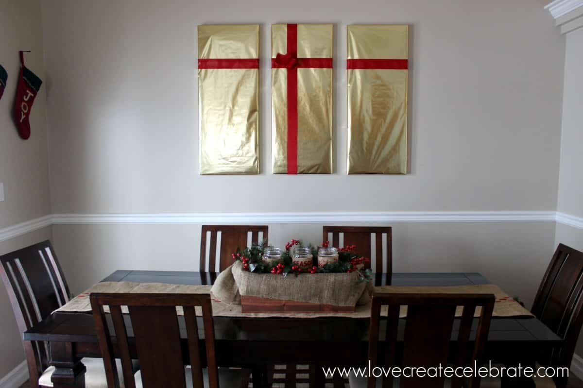 Wrap your paintings in Christmas wrapping to give them a festive look