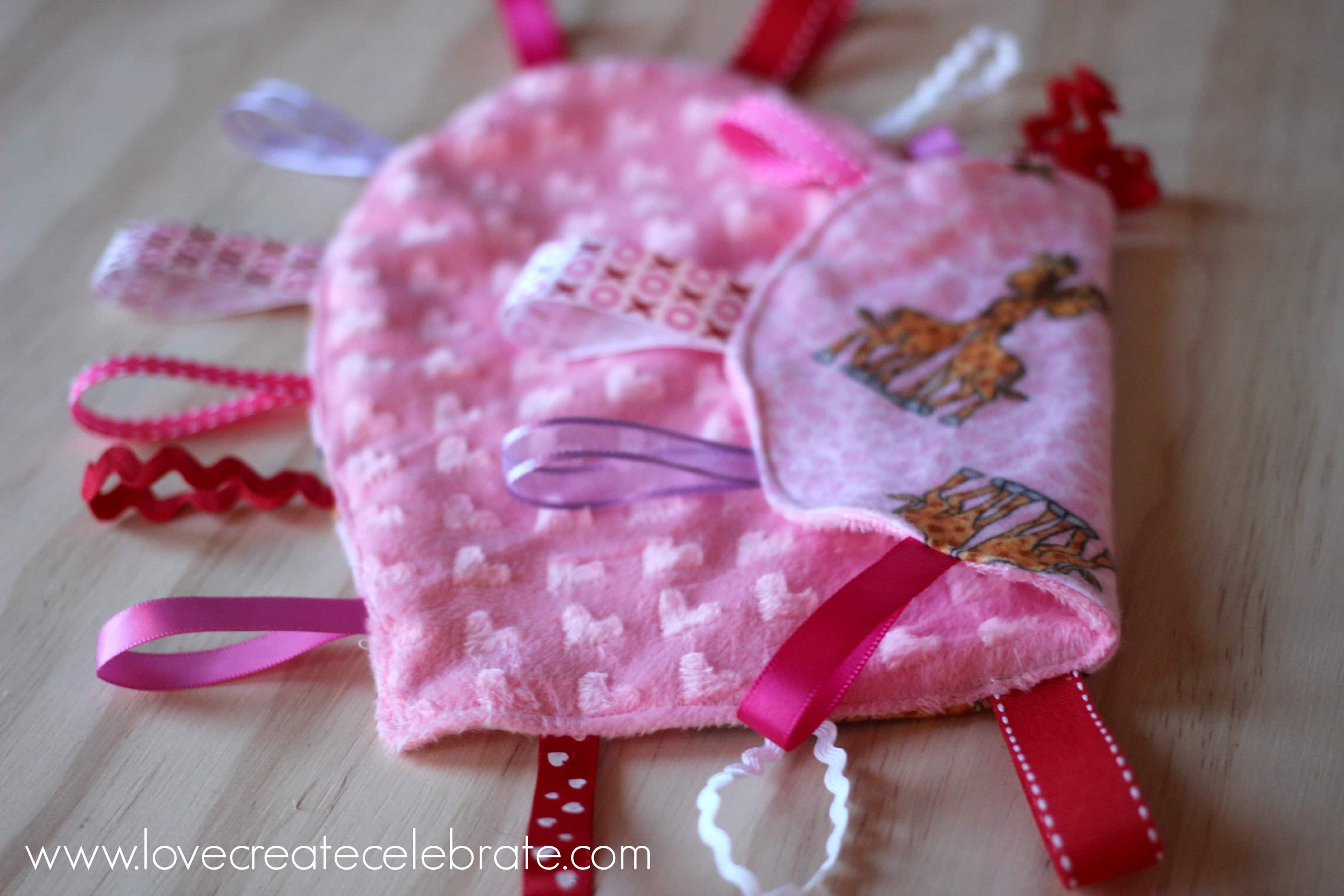 This heart taggie blanket is super soft for the littlest of hands.