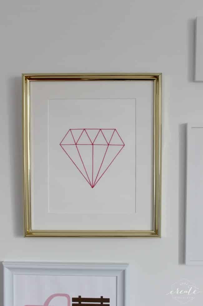 DIY tutorial for this Chic Diamond String Art using embroidery sting! Part of a beautiful white and gold gallery wall :) 