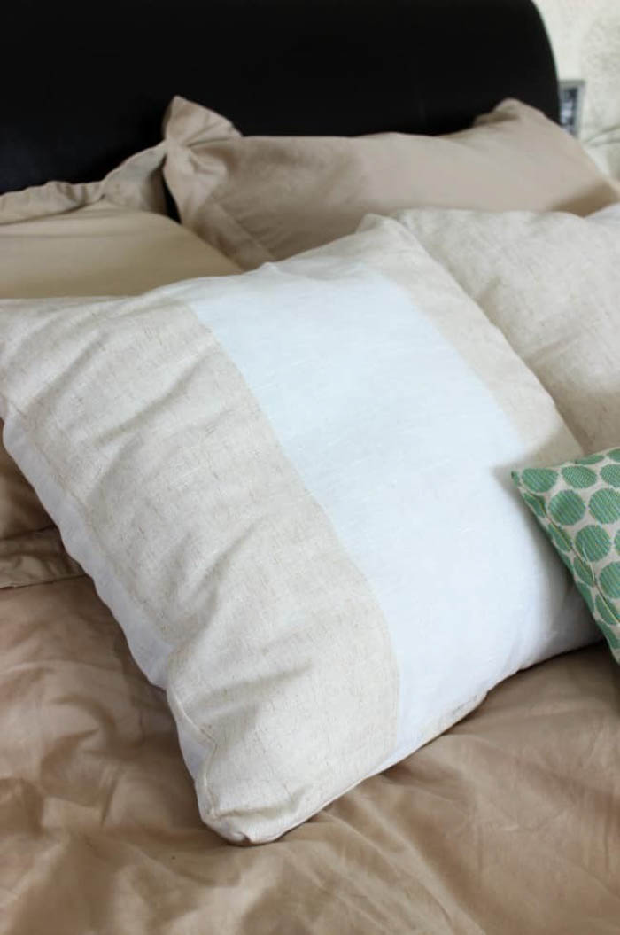 throw pillows on a bed