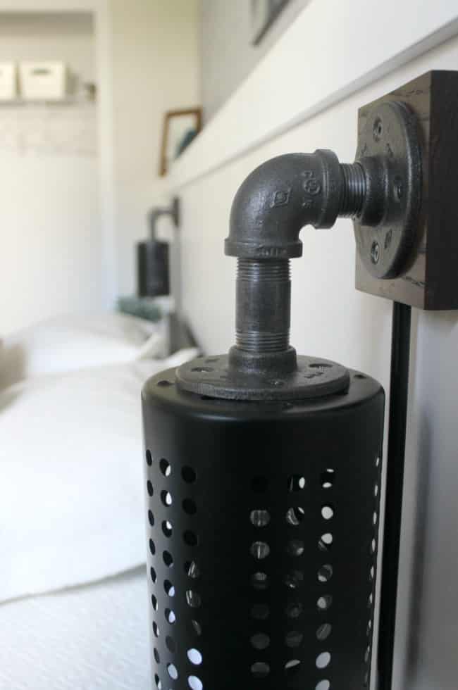 Love the mix of modern and industrial decor in this bedroom design! Great industrial pendant lights for beside the bed.