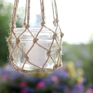 The perfect DIY outdoor decor for a summer party on the patio! All you need is jute string and mason jars!
