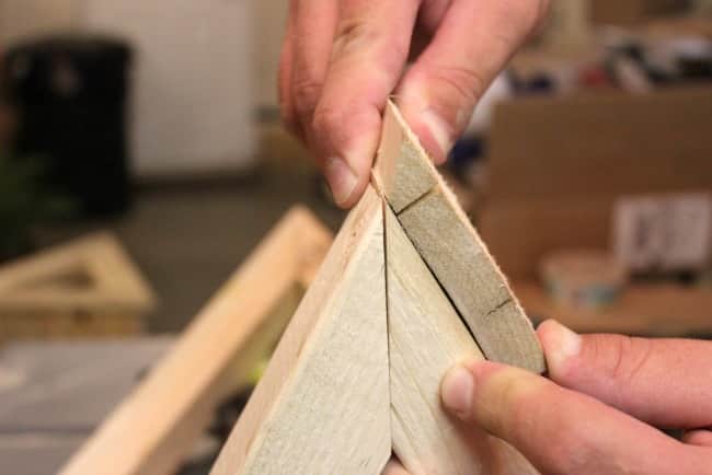 Nail the two boards together for the triangle pallet planters