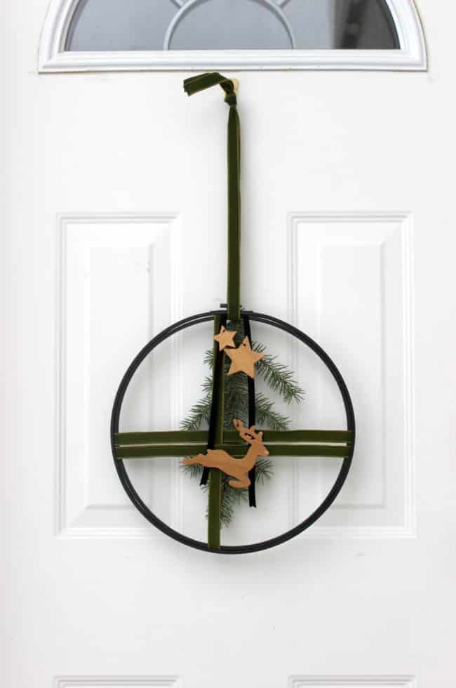 Modern Christmas wreath on a door.