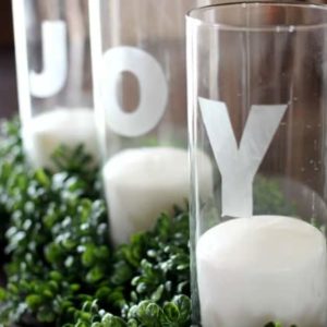 Love the etched glass lettering on this holiday centerpiece. Great idea for your holiday tablescape!