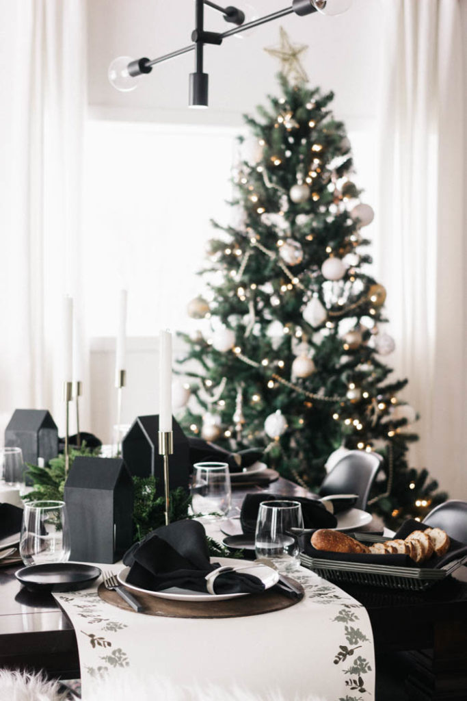 Gorgeous black, white, and gold holiday tablescape