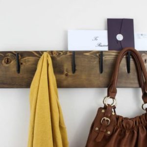 Make your own modern industrial coat rack with these free build plans! The perfect diy idea to organiza any entryway! Love the mail slot on top :)