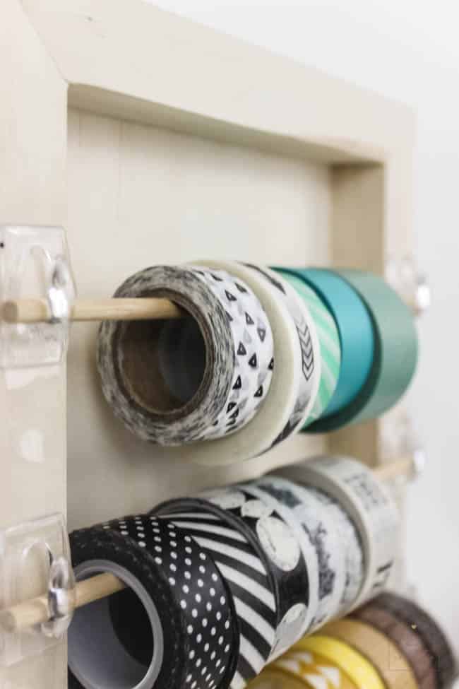 Organize your craft space with this simple DIY that will take you less than 5 minutes! Great for washi tape, ribbon, twine, etc. and PERFECT for any craft space!