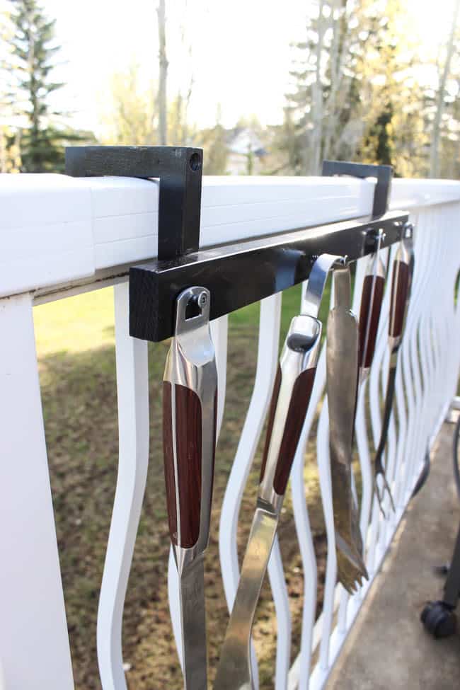 This DIY BBQ tool holder is the perfect deck accessory for summer grilling