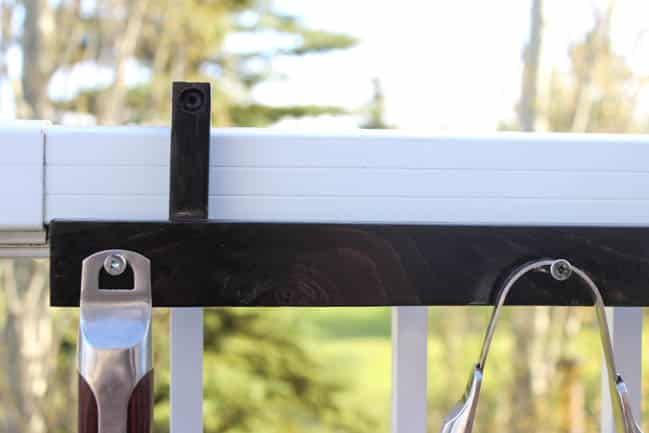 This BBQ tools holder hooks right over the side of the deck for easy set up