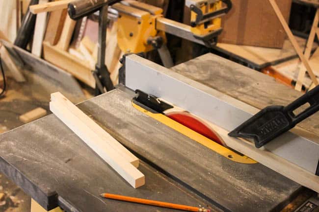 Use a table saw to cut all the wooden pieces needed for this DIY bbq tools holder