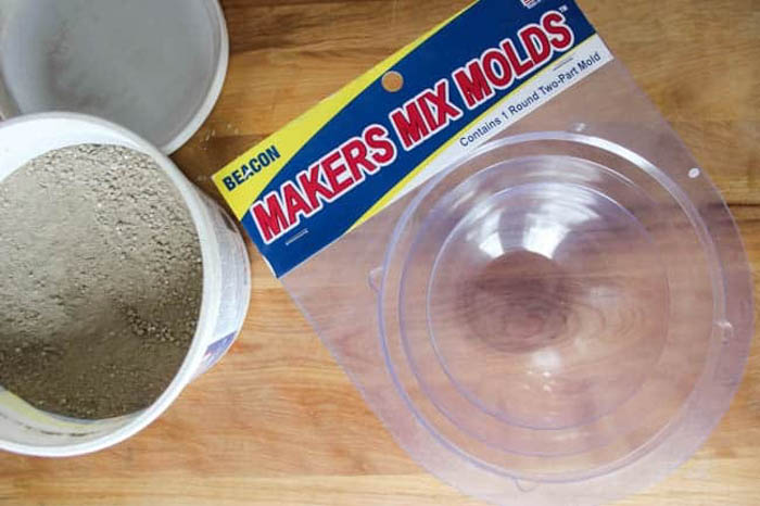 open container of Maker's Mix and concrete molds for DIY soap dish