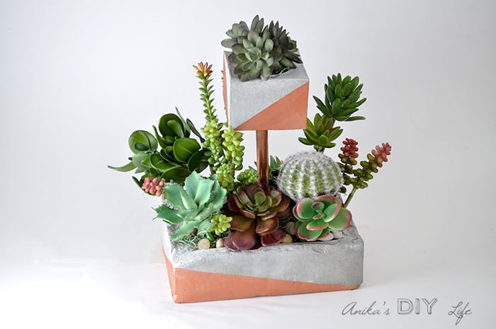 This tiered concrete planter makes a bold decorating statement.