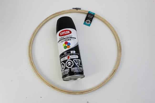 Spray paint and hoop used for the DIY minimalist wreath.