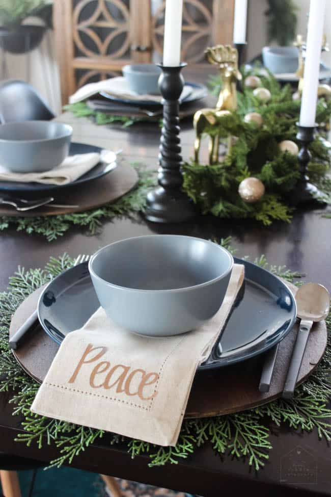 Tableware with greenery in the Christmas dining room 