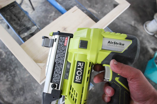Use your pin nailer to attach the wooden overlays