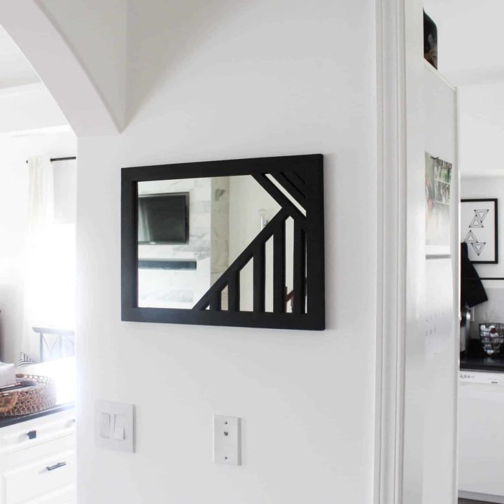 Beautiful DIY Mirror! Make your own modern mirror with this simple tutorial and a Ryobi pin nailer :) Love the geometric design! The perfect wooden mirror frame for any wall!