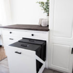 kitchen cabinet with pull out garbage and recycling storage