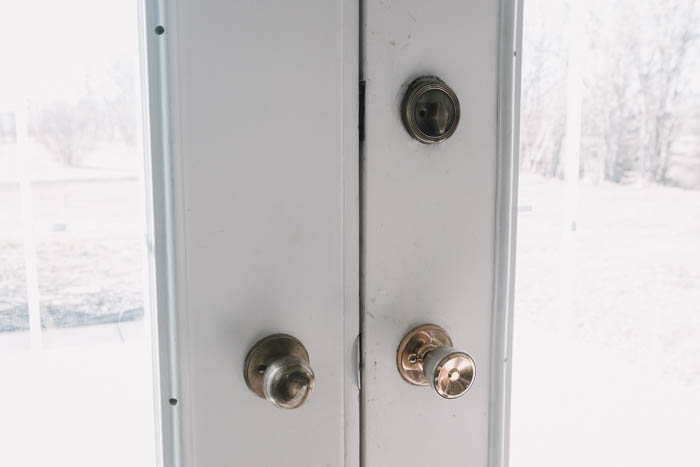 mismatched door hardware on old door