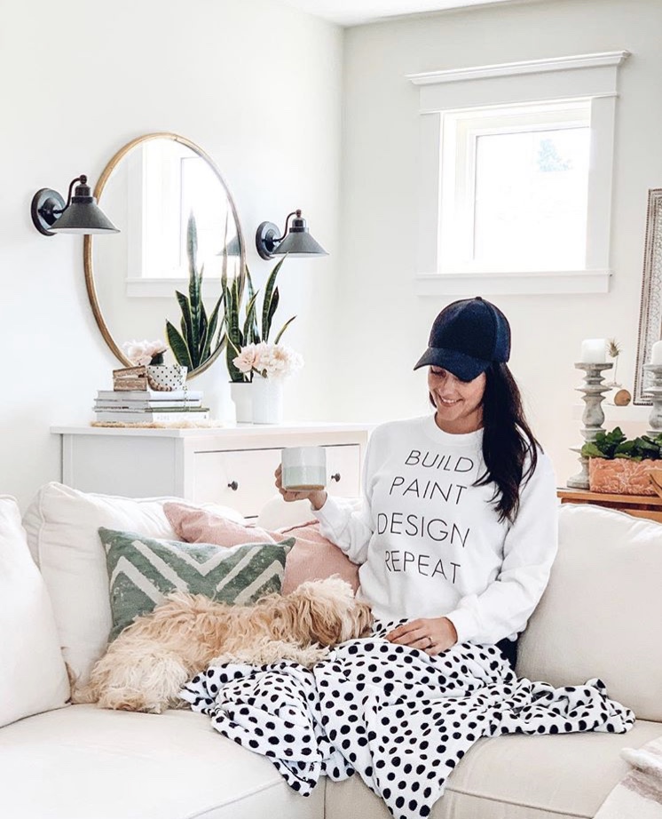 Designer sweatshirt on a DIYer at home
