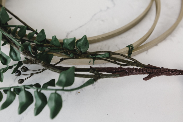 how to attach greenery to hoop wreath