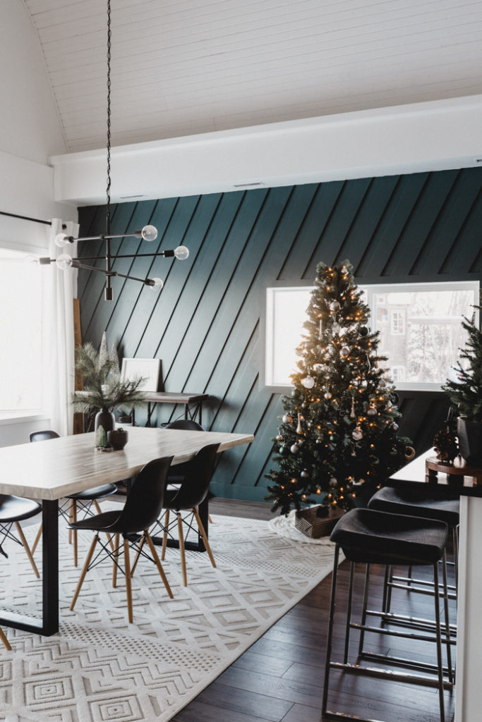 modern dining room decorated for Christmas