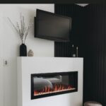 Modern fireplace with text reading DIY fireplace surround