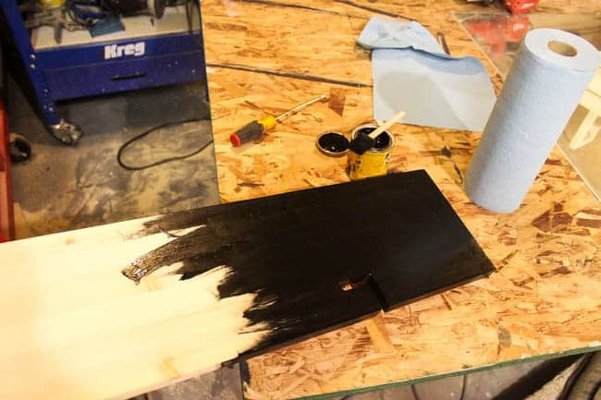 Staining the DIY bath tray with dark stain