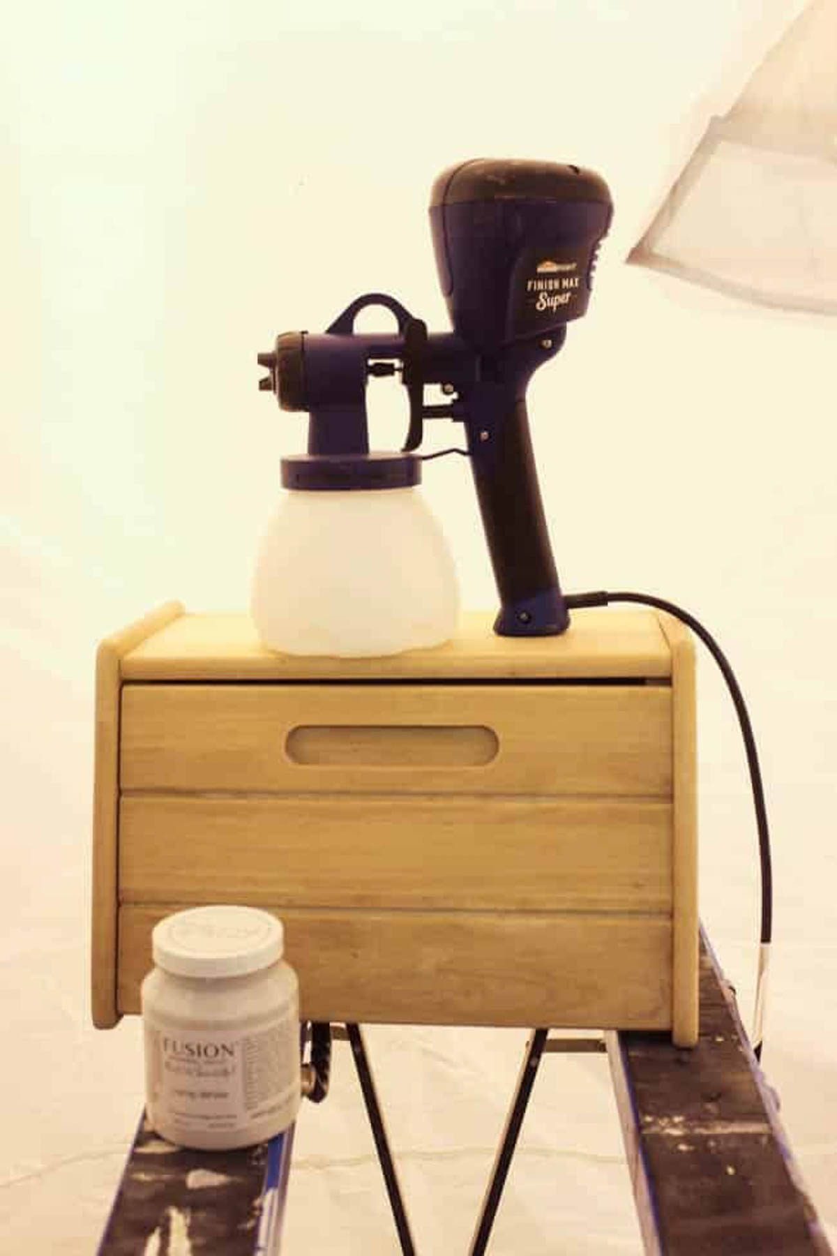 Spray gun used to paint the DIY bread box