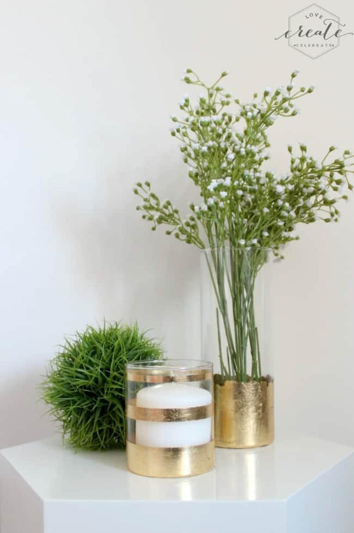 Finished gold leaf vase and candle holder designed with gold leaf