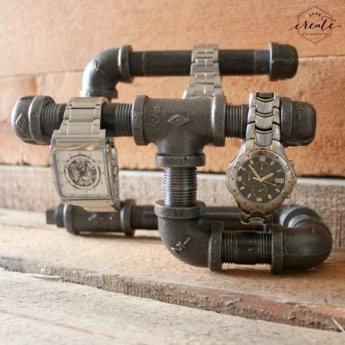 Industrial watch holder holding three men's watches