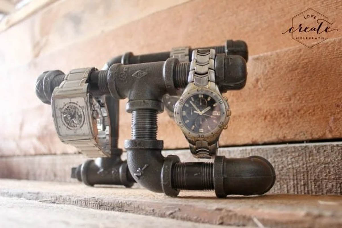 Industrial watch holder with three men's watches