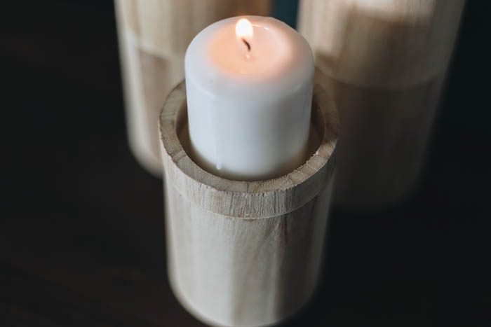 close up of pillar candleholder with candle