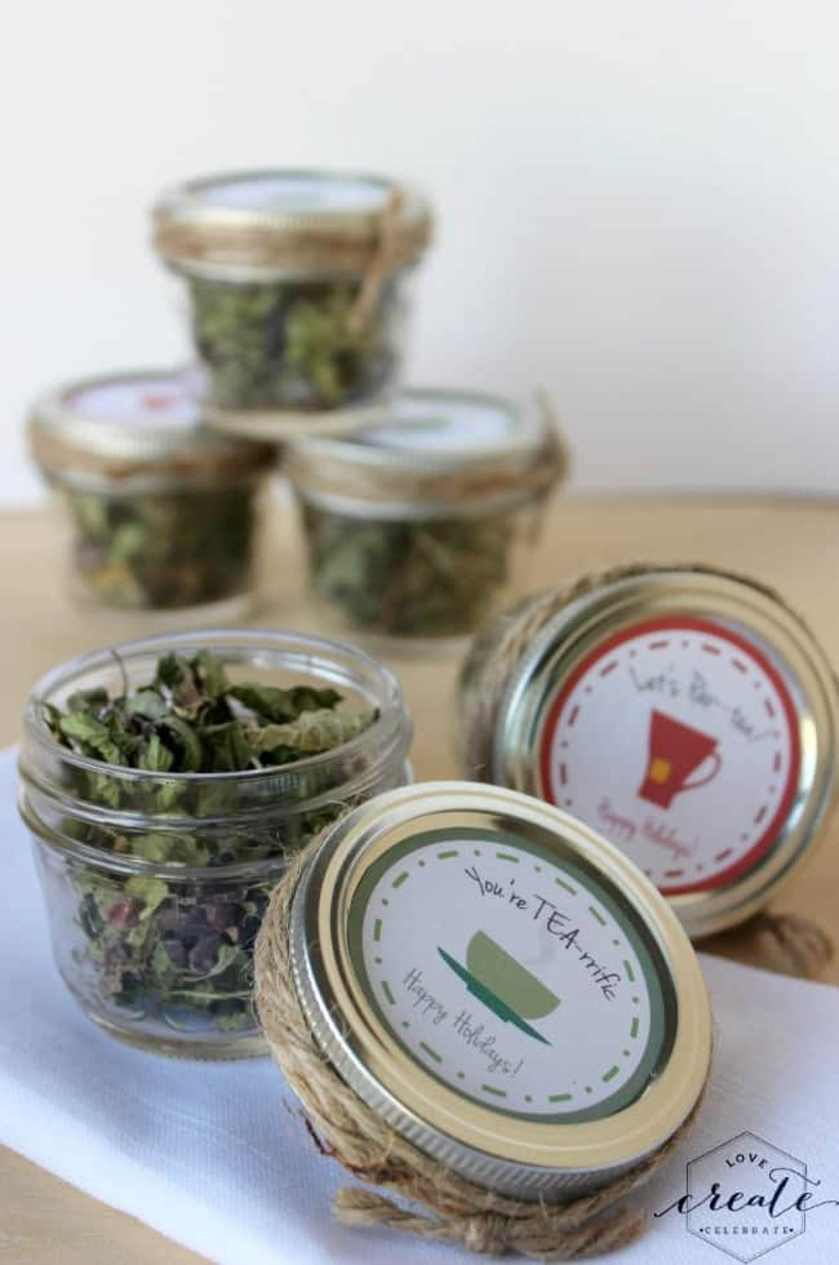 Individual containers of fresh peppermint tea leaves.