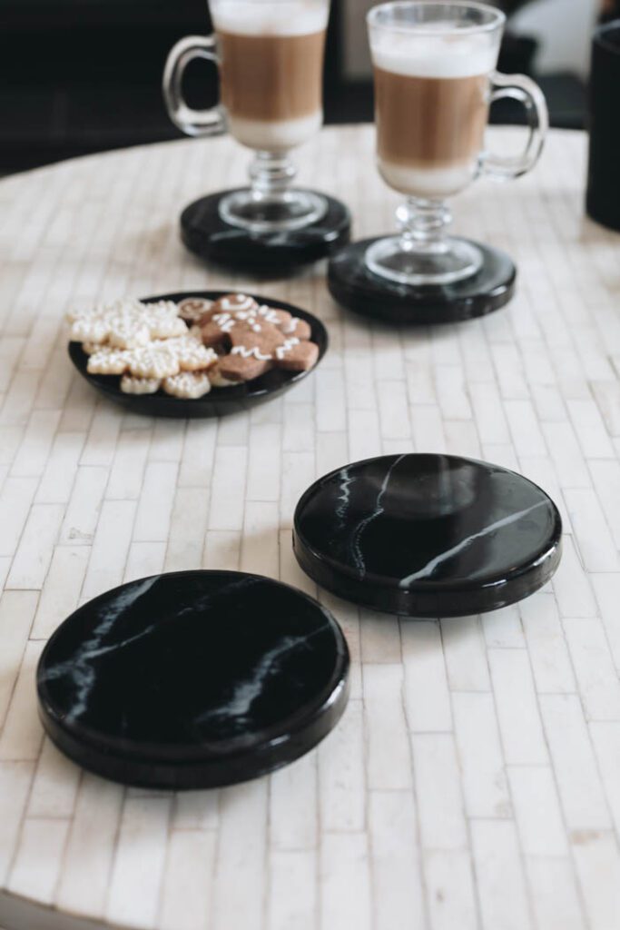 black marble resin coasters with coffee mugs