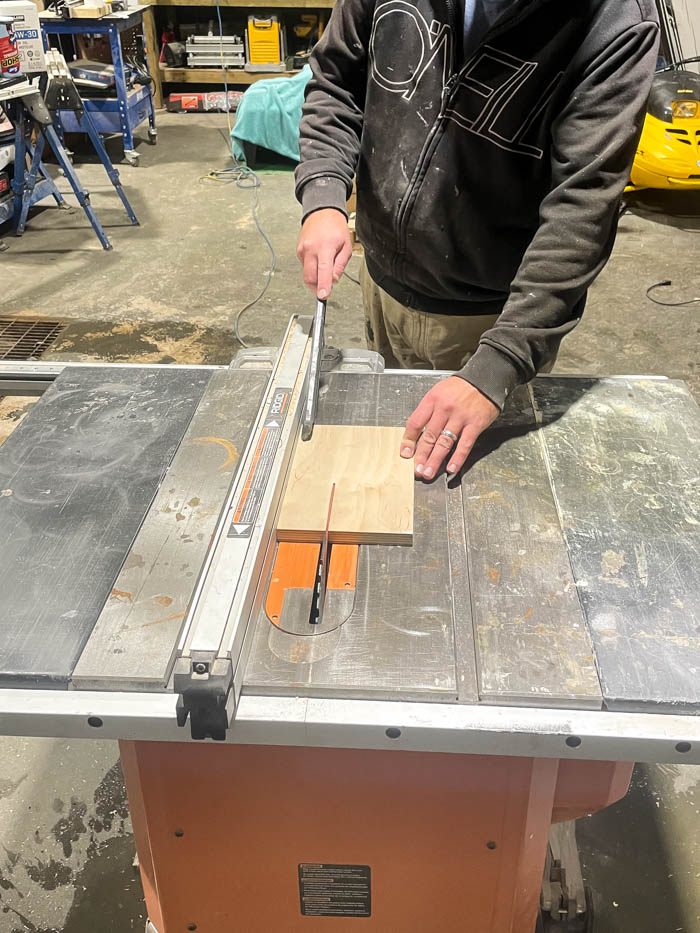 cutting wood on table saw