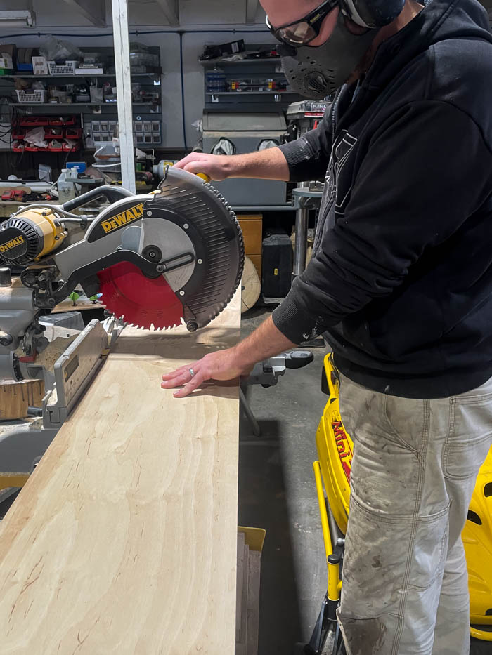 cutting wood on mitre saw