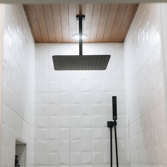 3D white tile in shower 
